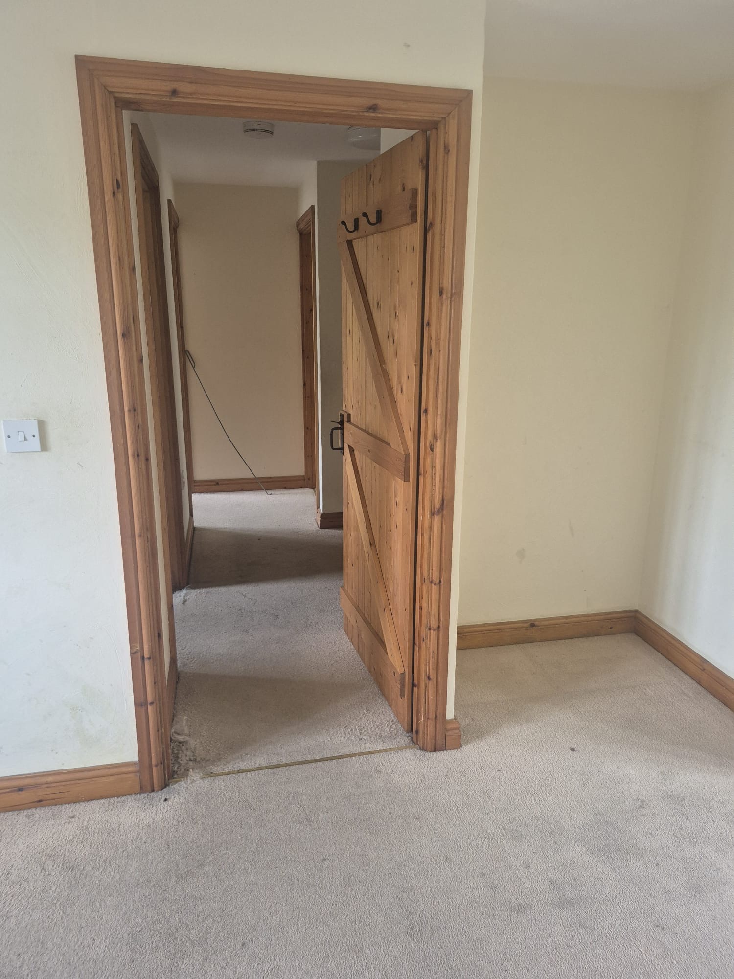 Bathroom with wooden doors and tiled floor